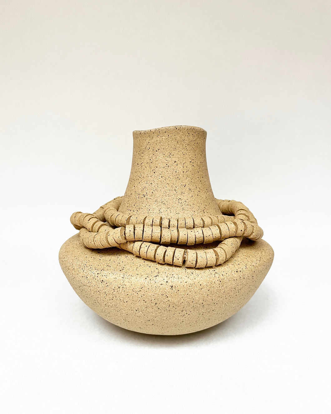 Handbuilt vase with beads